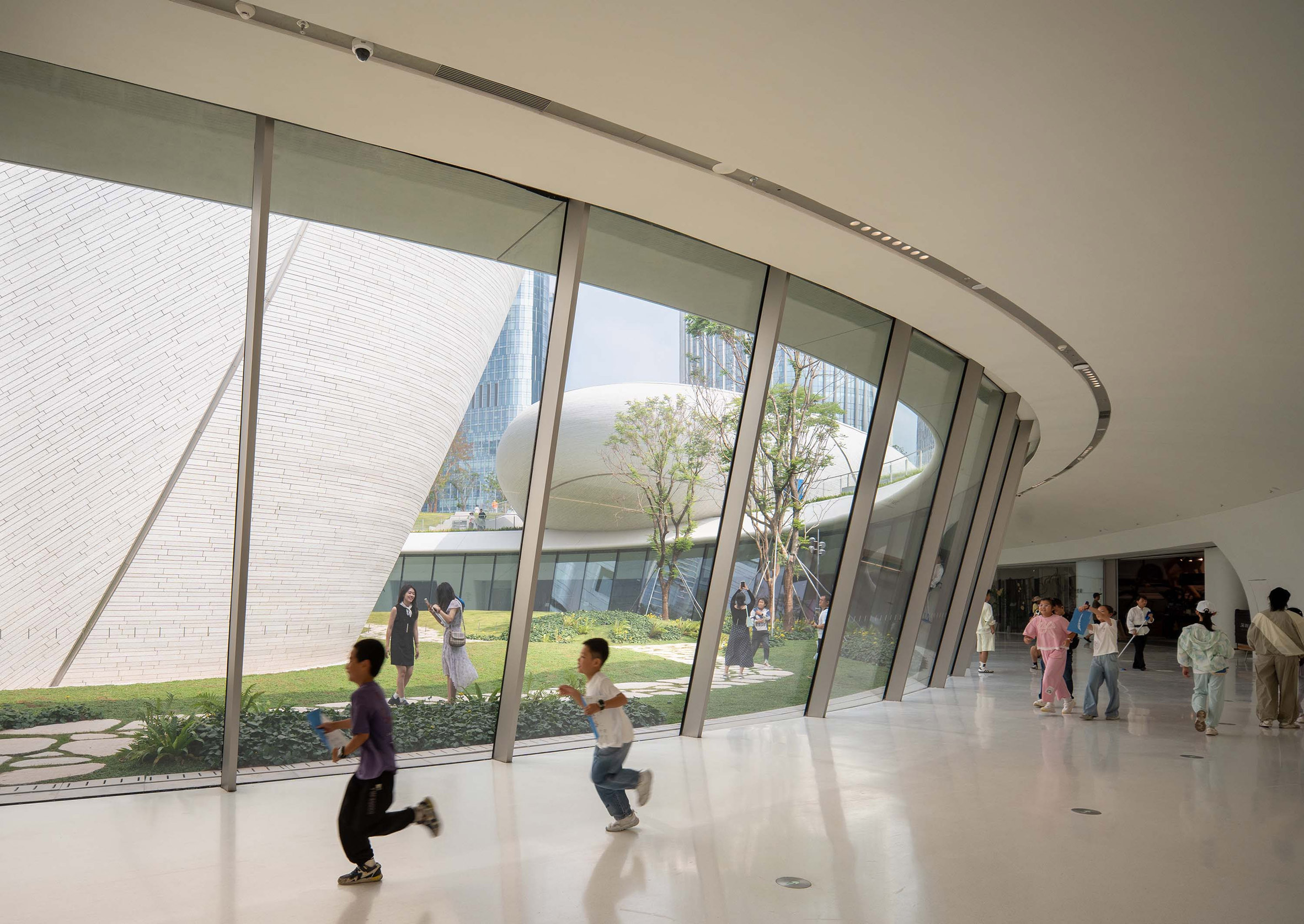 MAD completes design museum under green hill in Shenzhen
